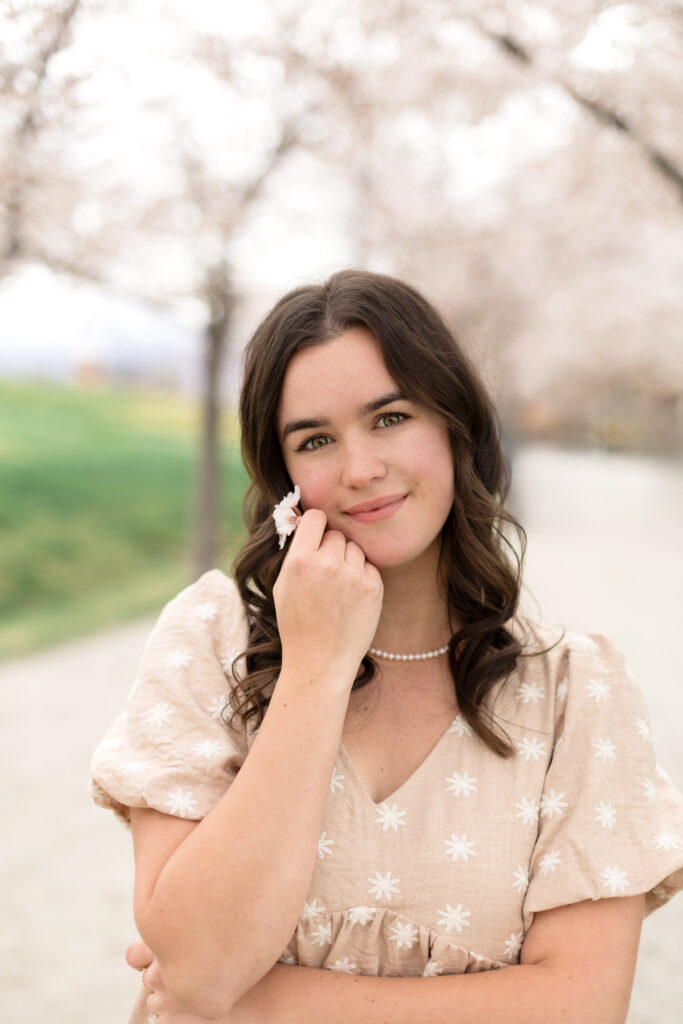 Light and airy cherry blossom portraits taken in Utah during peak spring bloom.