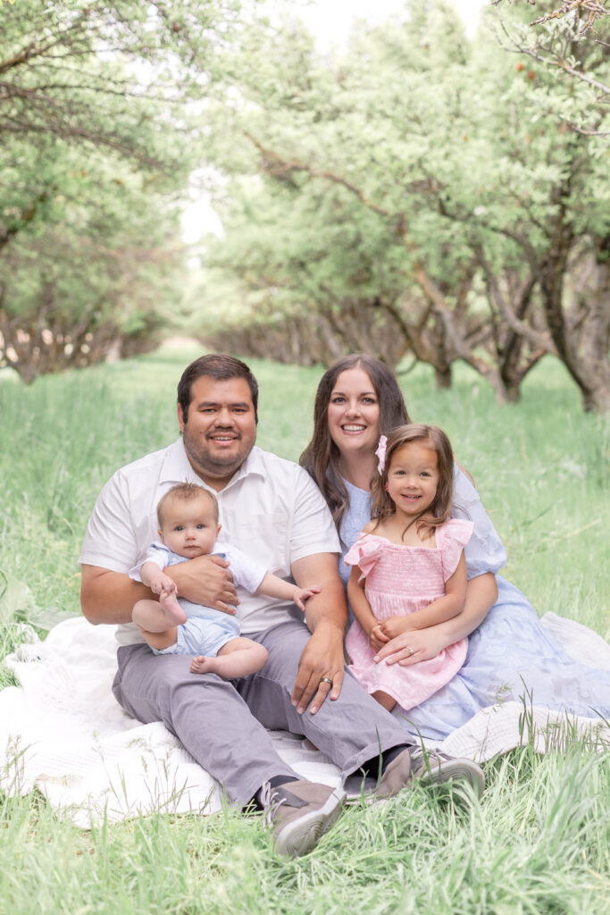 Natural spring family photography in a Utah orchard